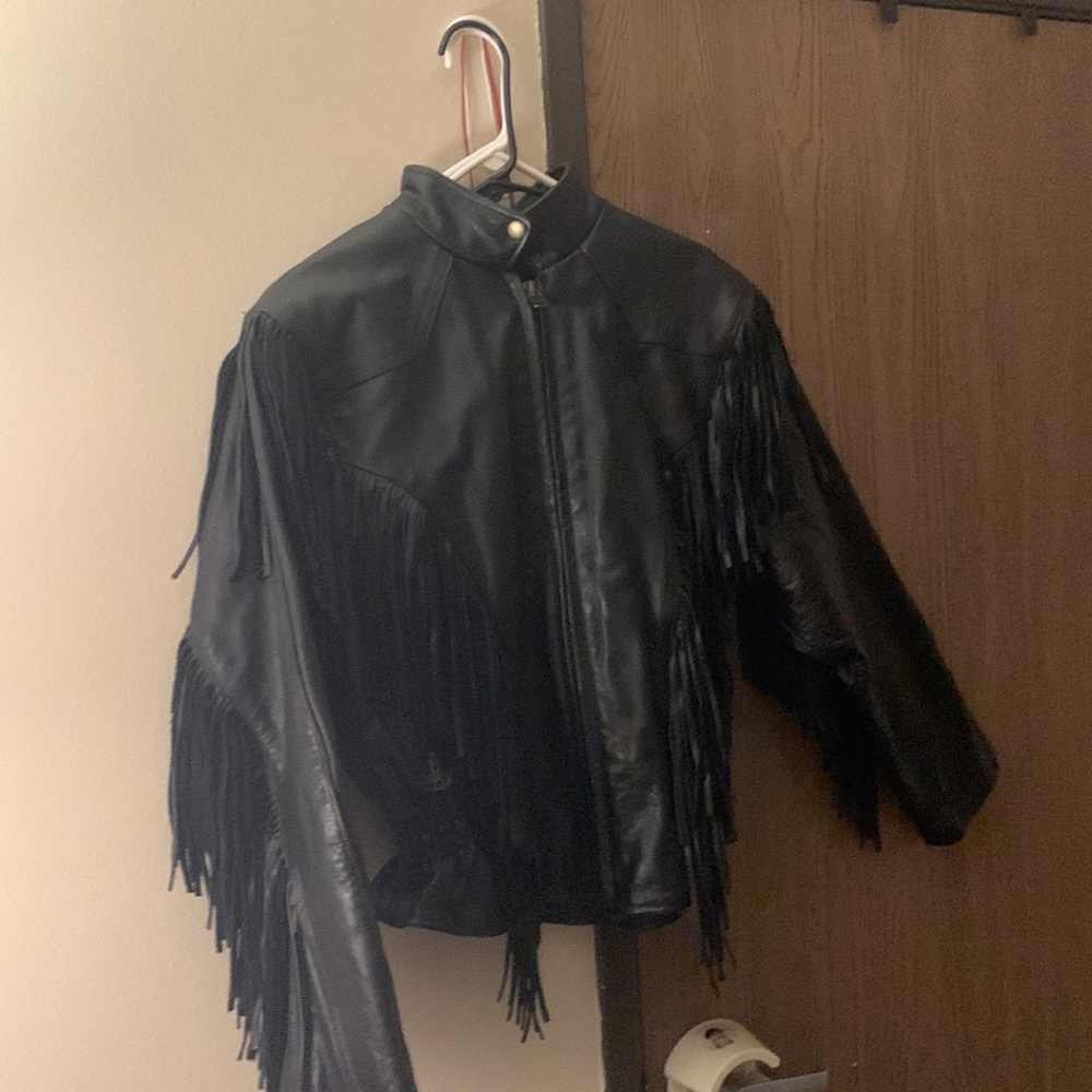 Motorcycle jacket with fringes.